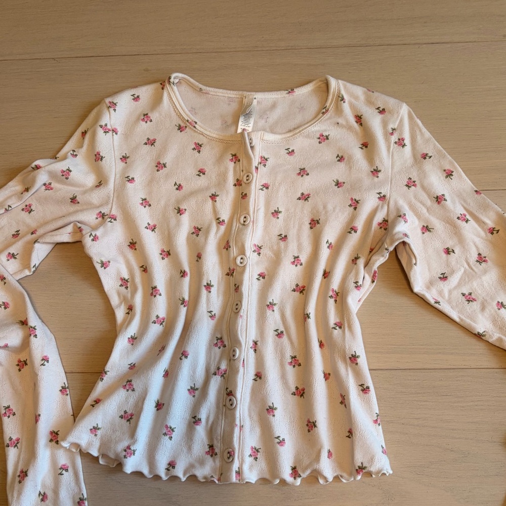 SKIMS Cream Ribbed Top with Subtle Pink Accents